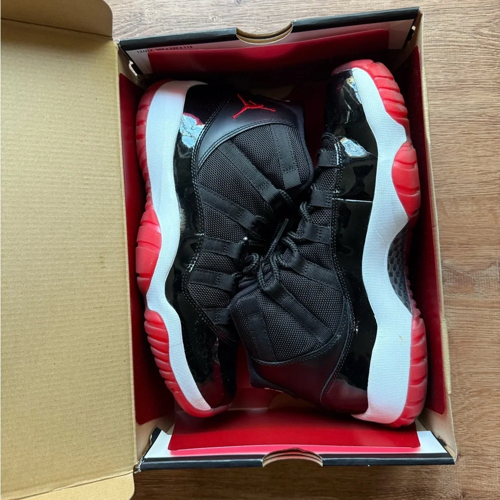 Air Jordan 11 Bred Black and Red High-Top Basketball Sneakers